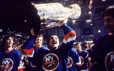 Islanders Holding Up Cup